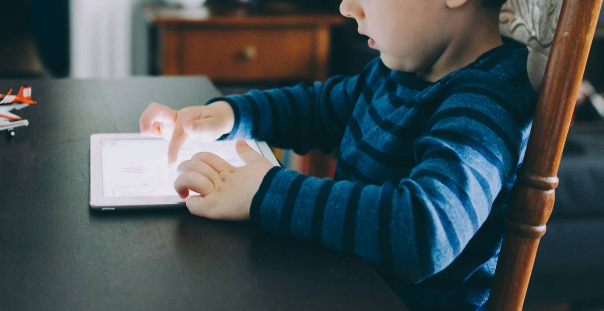 book reading app for dyslexia showing OpenDyslexic font and highlighted text on a tablet screen